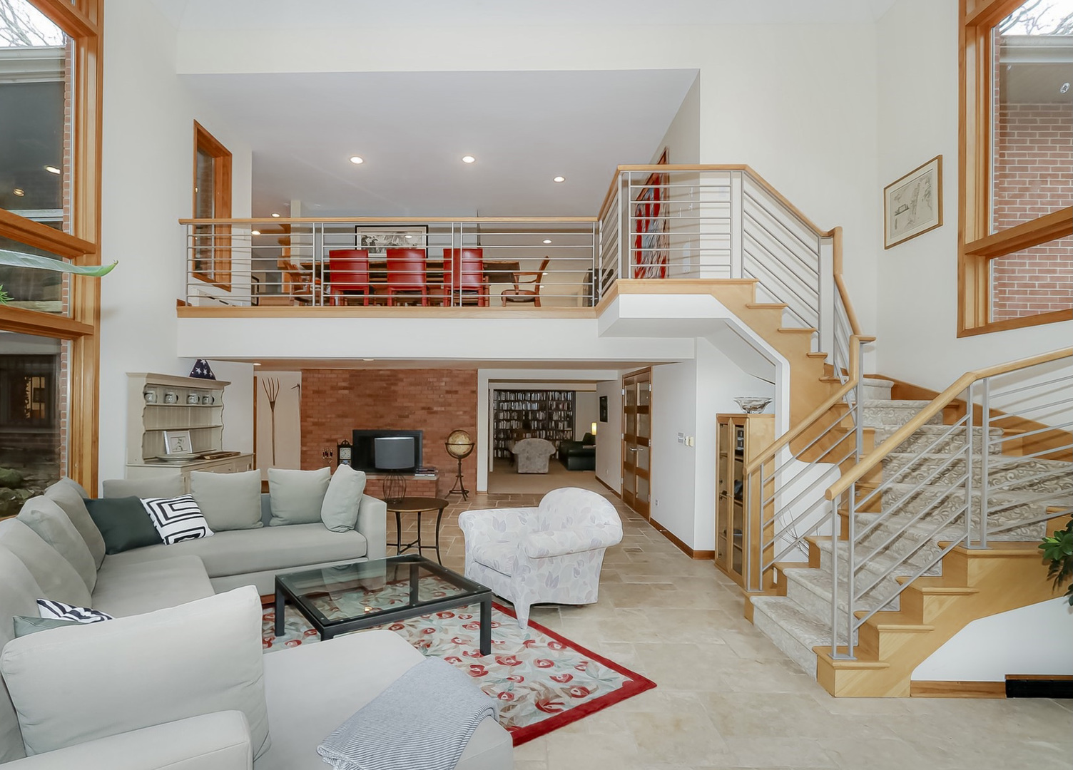 363 Bateman Road Barrington Hills, IL 60010 - Photo 9 of 40 a living room with furniture fireplace and a flat screen tv