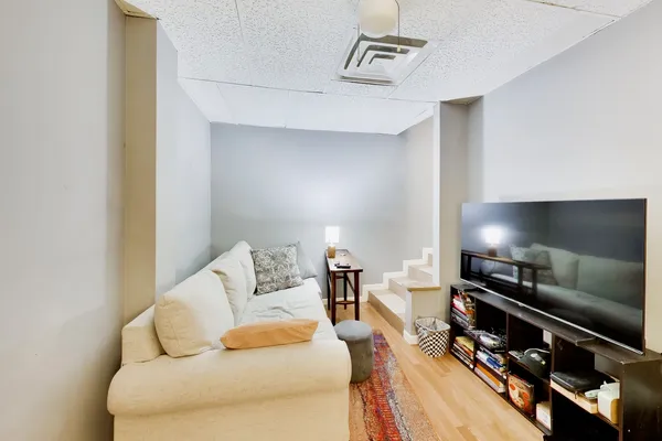 a living room with furniture and a table