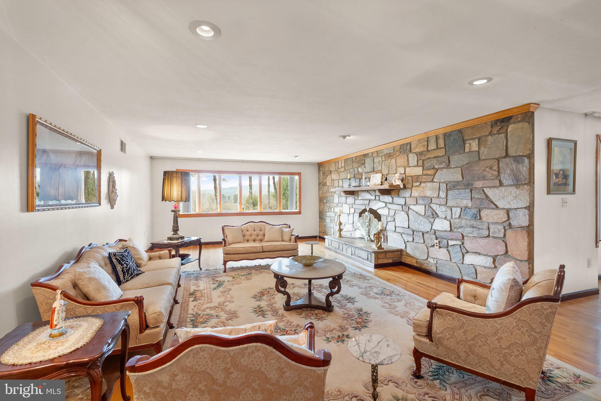375 7 Ponds Road Amissville, VA 20106 - Photo 41 of 106 grand formal living room w/stone fireplace