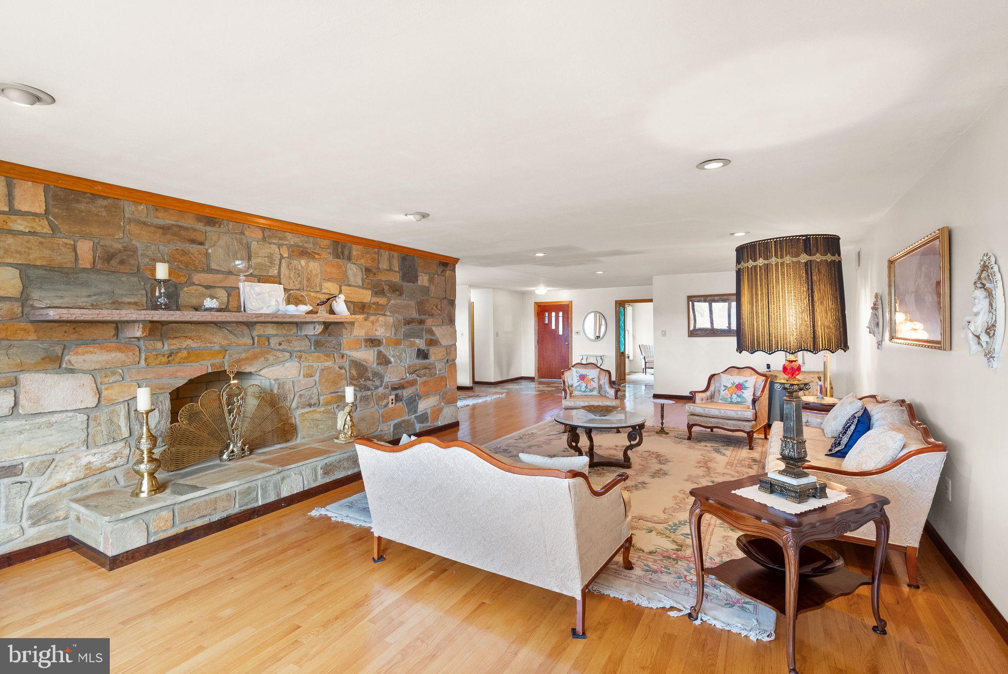 375 7 Ponds Road Amissville, VA 20106 - Photo 43 of 106 grand formal living room w/stone fireplace