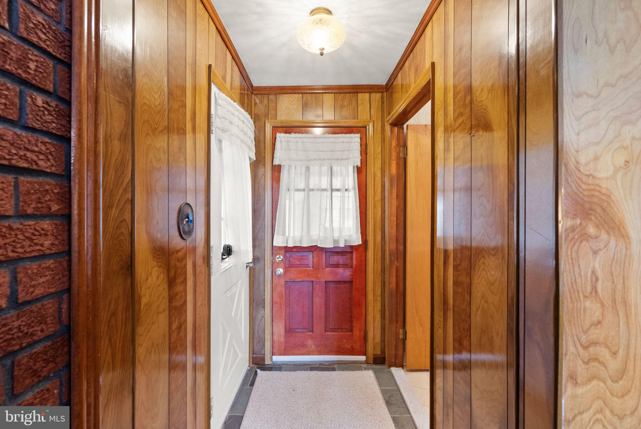 375 7 Ponds Road Amissville, VA 20106 - Photo 76 of 106 hall to laundry and garage