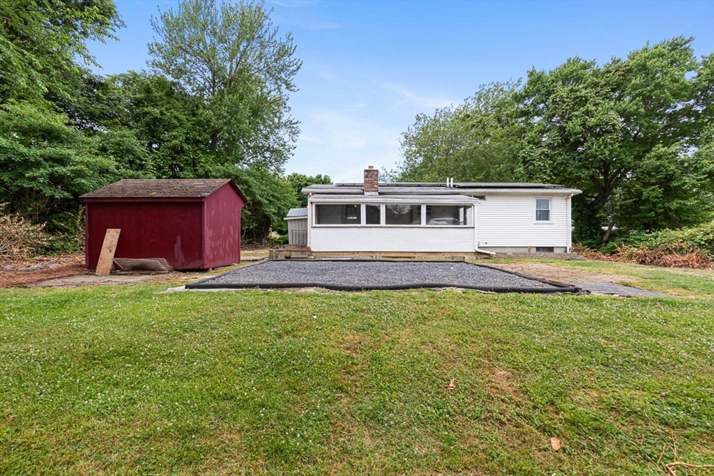 99 Swansom Road Swansea, MA 02777 - Photo 40 of 42 a front view of a house with garden
