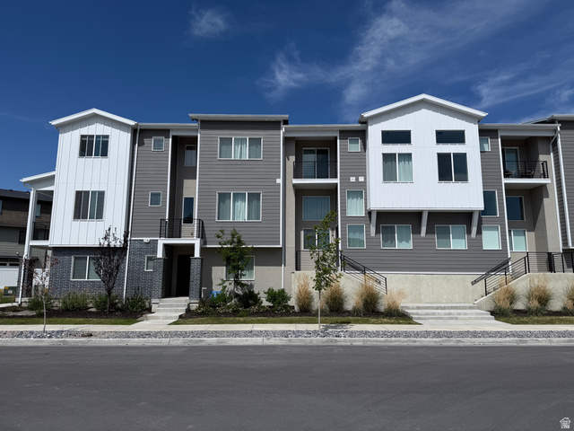 774 West 480 South American Fork, UT 84003 - Photo 1 of 76 Contemporary multi-story townhome residences featuring varied grey siding and white architectural accents