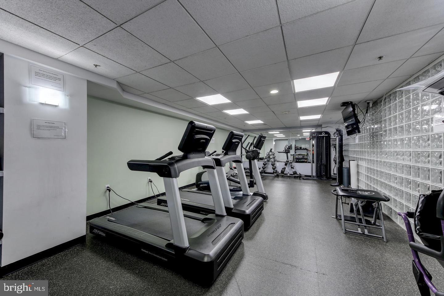 1117 10th Street Northwest, Unit 301 Washington, DC 20001 - Photo 28 of 38 a view of a room with gym equipment
