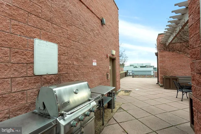 a building exterior with furniture