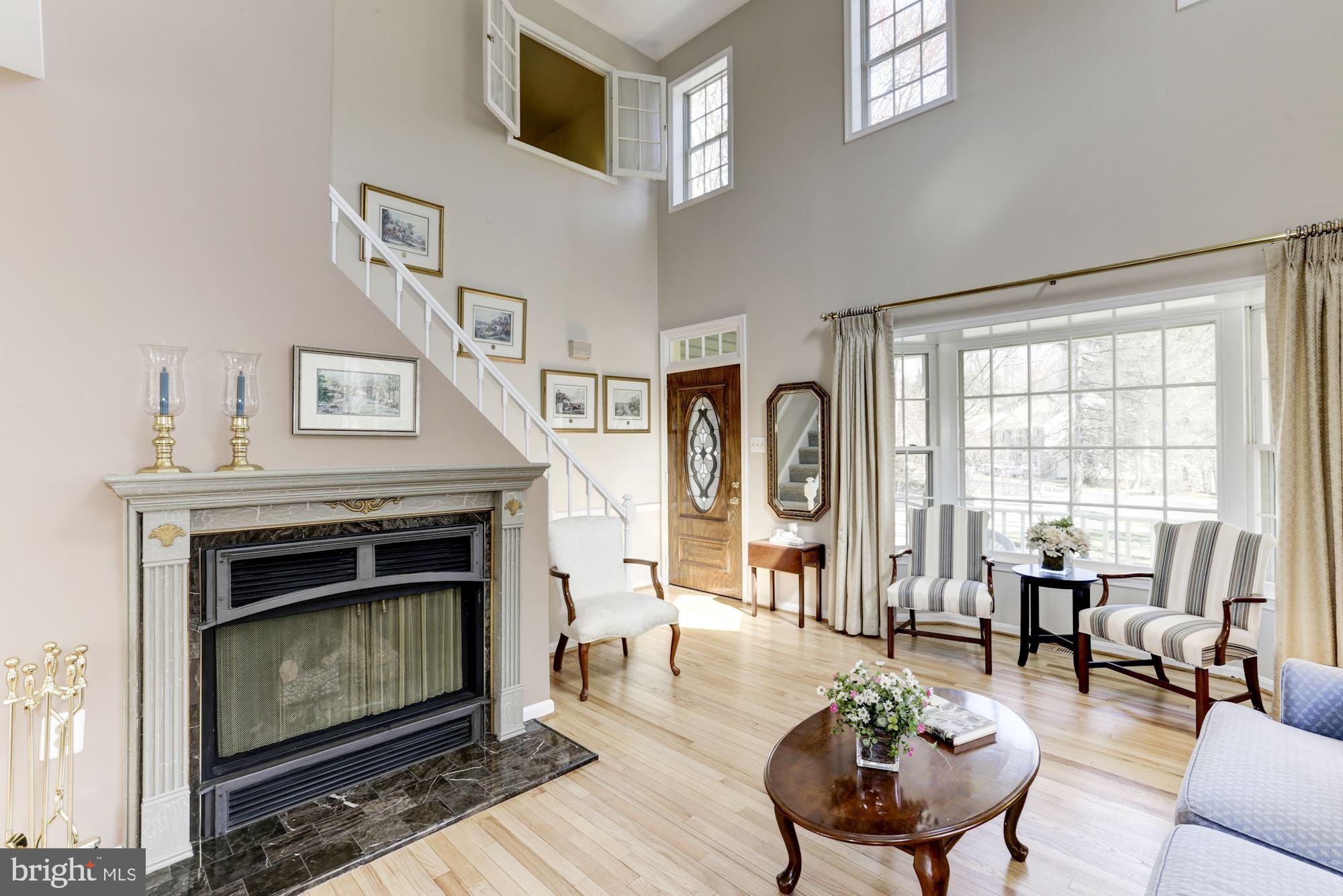 11677 Bennington Woods Road Reston, VA 20194 - Photo 14 of 51 Cozy fireplace w/marble surround & custom mantle