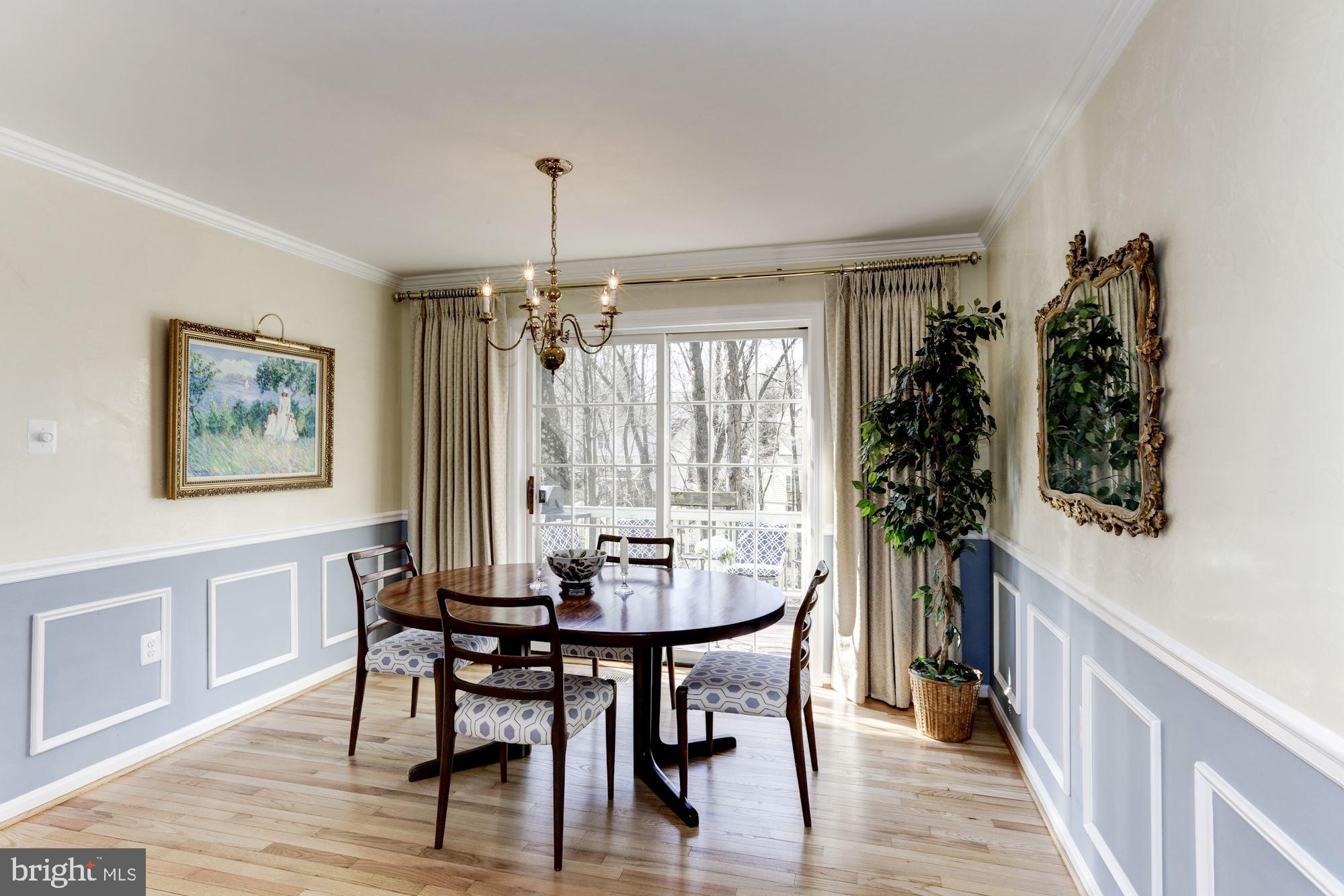 11677 Bennington Woods Road Reston, VA 20194 - Photo 16 of 51 Sun-filled DR has hardwood floor & door to deck