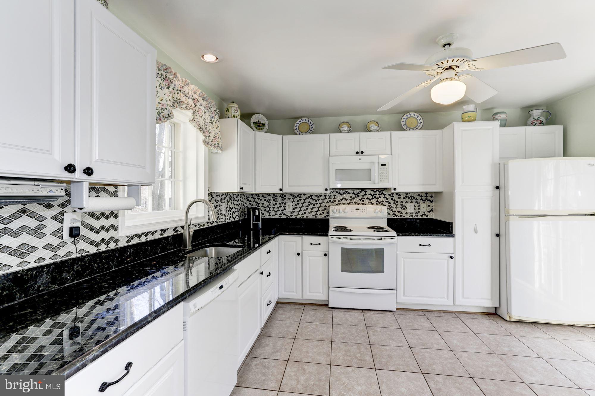 11677 Bennington Woods Road Reston, VA 20194 - Photo 19 of 51 Spacious gourmet kitchen has tons of cabinets