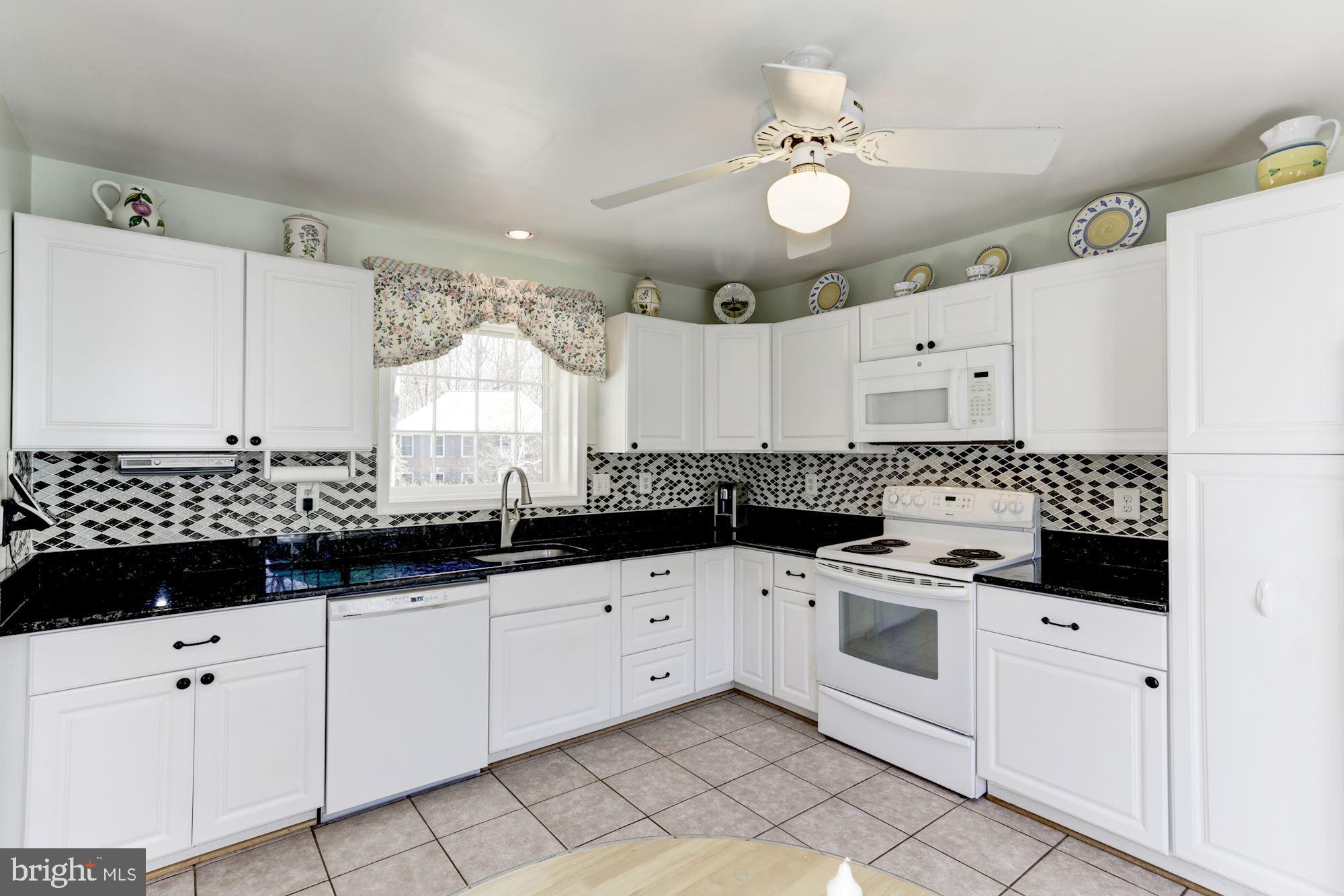 11677 Bennington Woods Road Reston, VA 20194 - Photo 20 of 51 Renovated kit w/granite, tile floors & backsplash