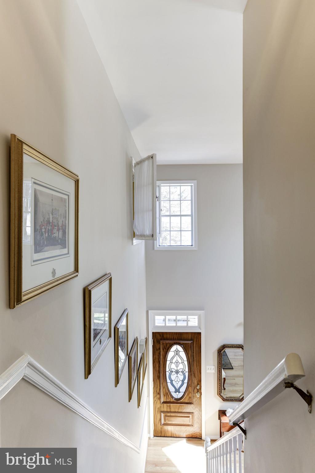 11677 Bennington Woods Road Reston, VA 20194 - Photo 25 of 51 View of front door from the upper level.