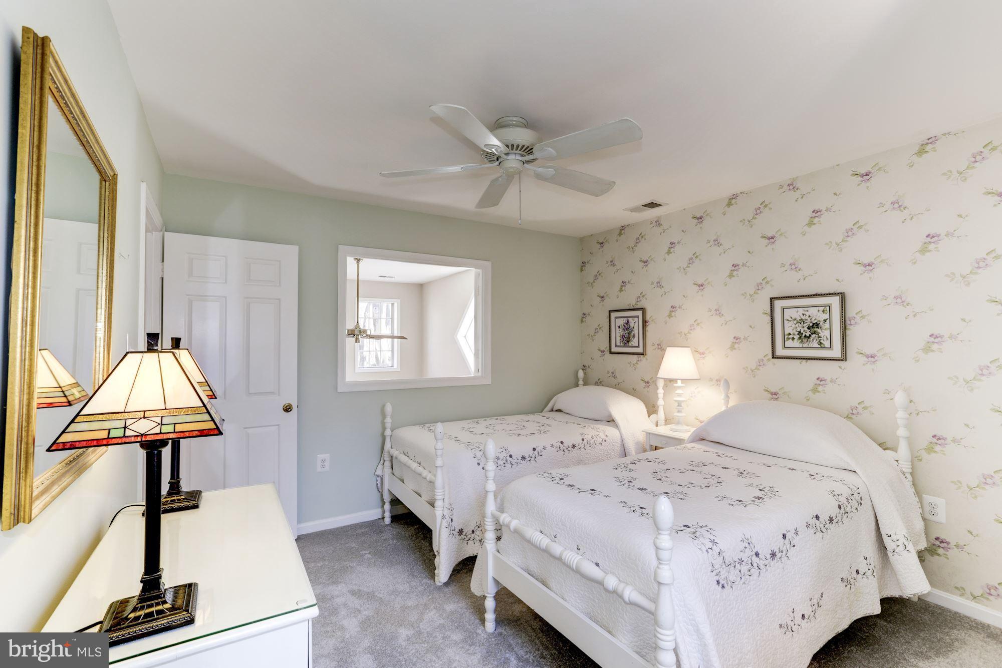 11677 Bennington Woods Road Reston, VA 20194 - Photo 35 of 51 The interior window in the 2nd BR overlooks the LR