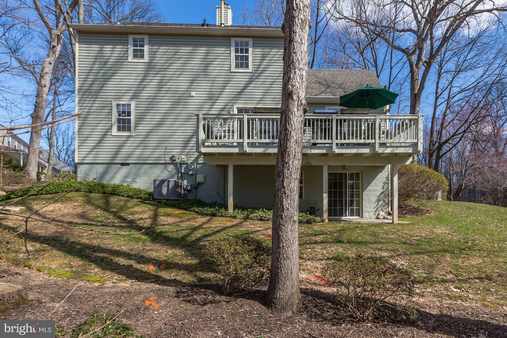 11677 Bennington Woods Road Reston, VA 20194 - Photo 46 of 51 View of yard with deck and walk-out from lower lvl