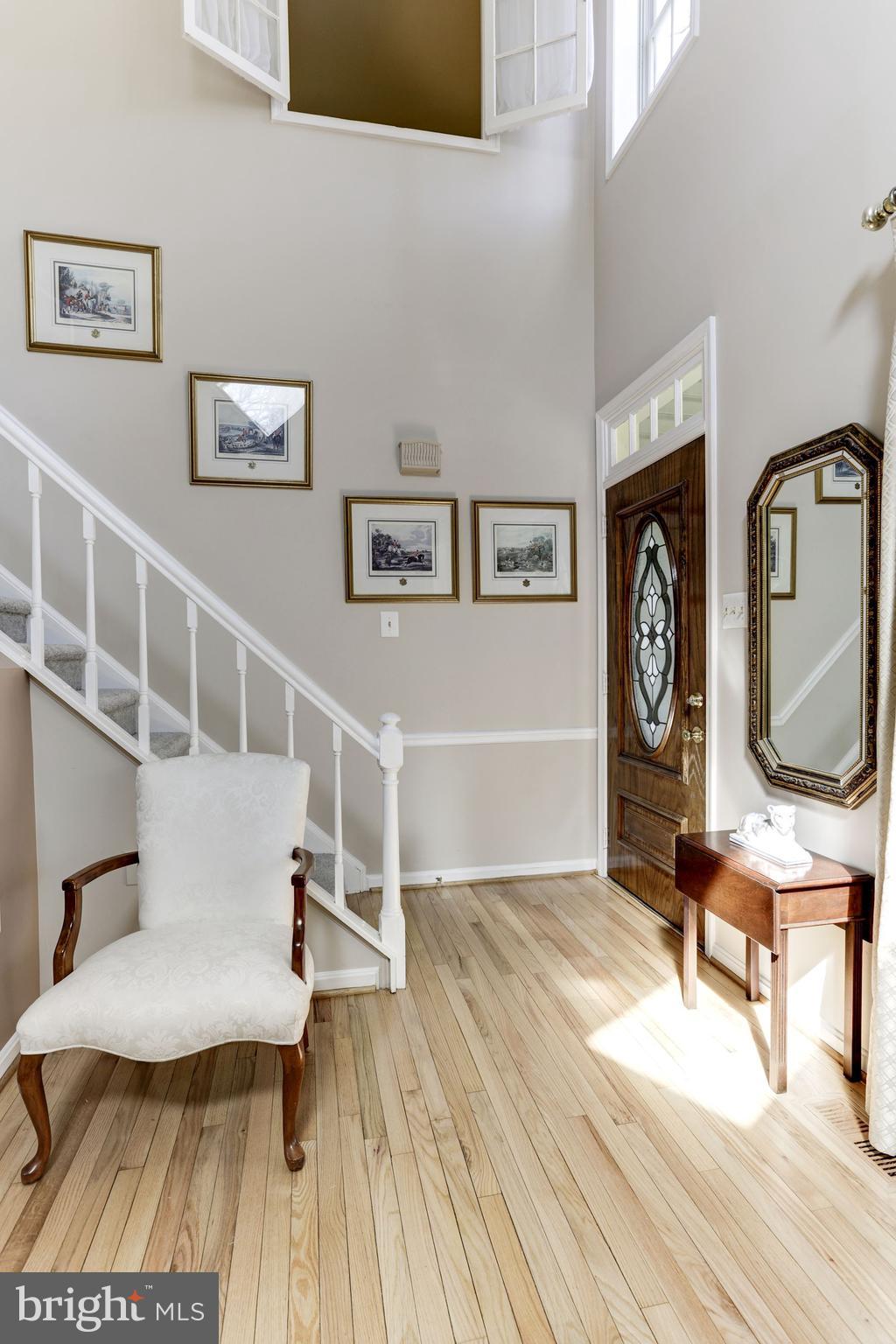11677 Bennington Woods Road Reston, VA 20194 - Photo 9 of 51 Dramatic front entry with 2-story ceiling