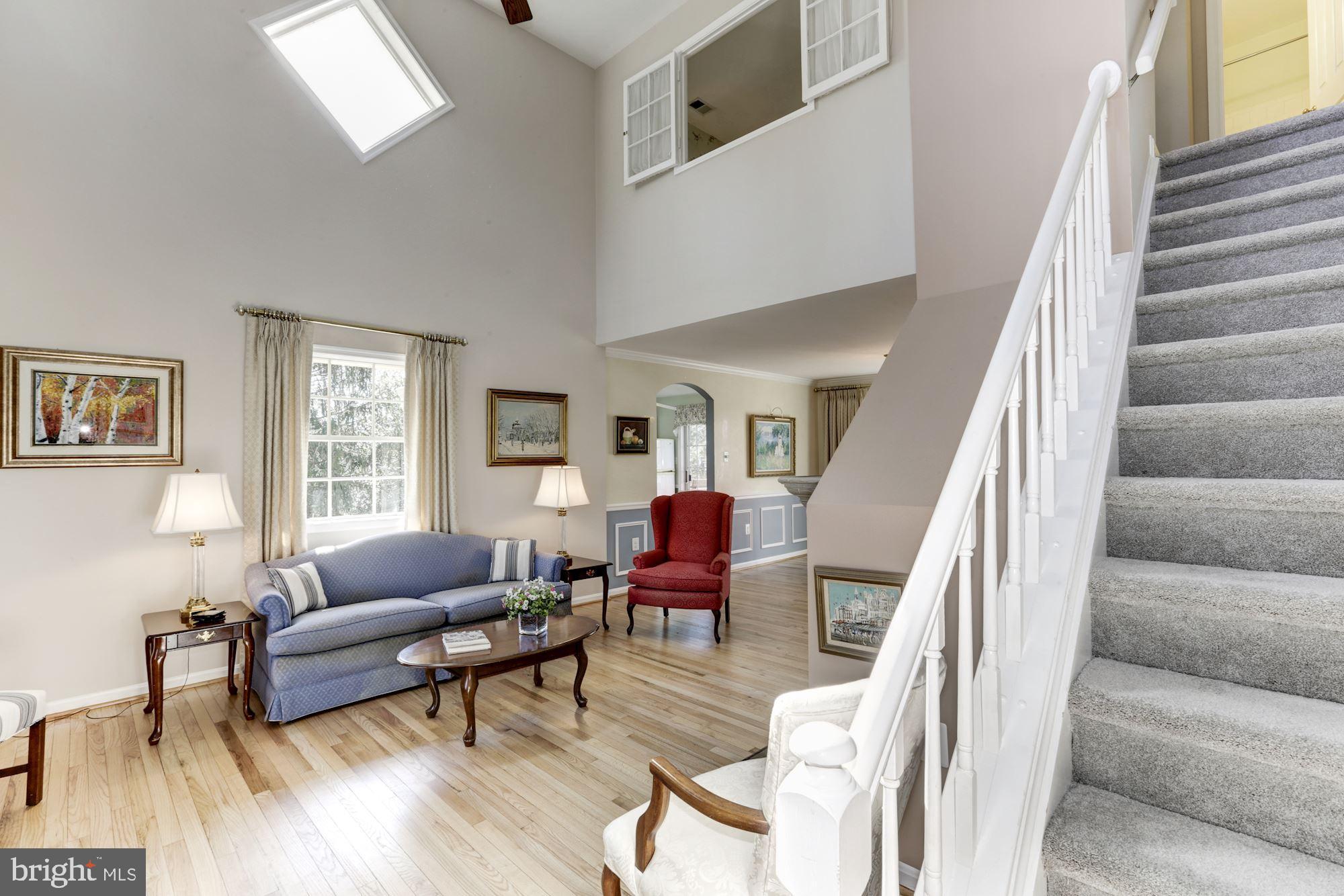 11677 Bennington Woods Road Reston, VA 20194 - Photo 10 of 51 2-story LR has an interior window from BR above.