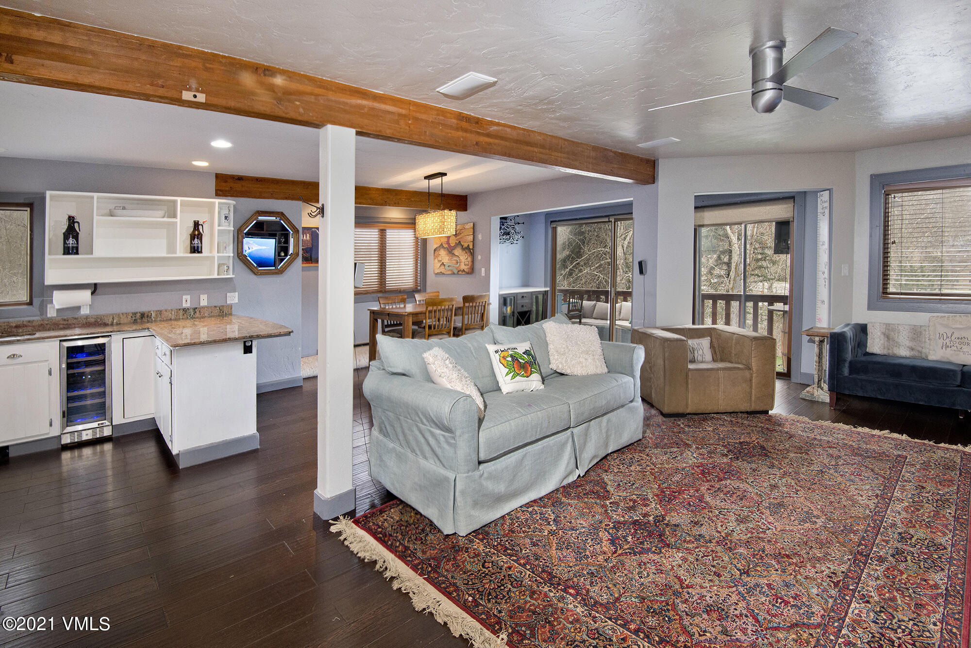211 Nottingham Road, Unit F Avon, CO 81620 - Photo 5 of 26 a living room with furniture and a fireplace