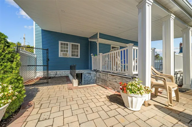 a front view of a house with patio