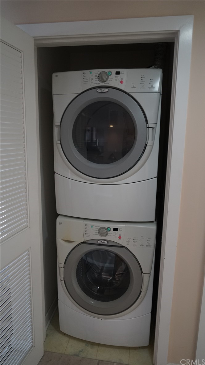 400 West Ocean Boulevard, Unit 206 Long Beach, CA 90802 - Photo 19 of 20 a utility room with dryer and washer