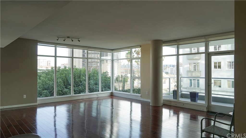 400 West Ocean Boulevard, Unit 206 Long Beach, CA 90802 - Photo 5 of 20 a view of a large window with wooden floor