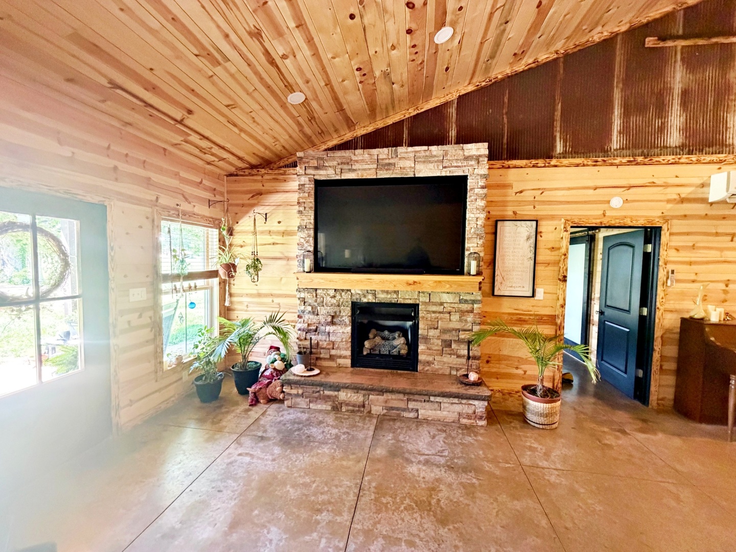 6945 Unity School Road Brookport, IL 62910 - Photo 16 of 42 a living room with fireplace furniture and a flat screen tv