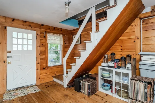 a view of entryway with a front door