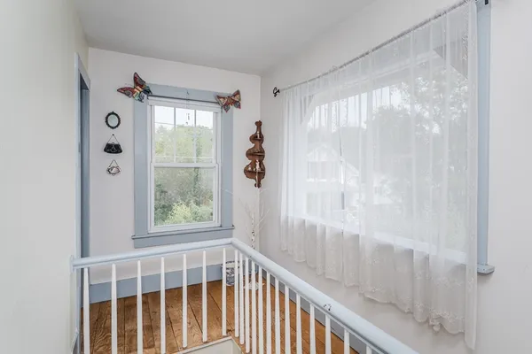 a workspace with furniture and window