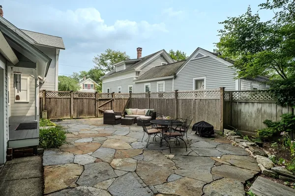 a backyard of a house with lots of green space