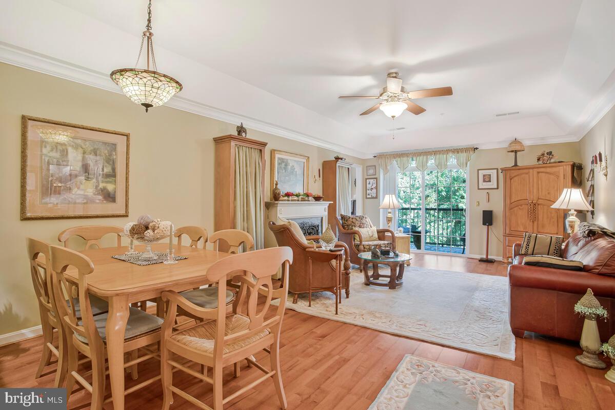 7315 Maplecrest Road, Unit 405 Elkridge, MD 21075 - Photo 11 of 76 a view of a dining room with furniture window and outside view