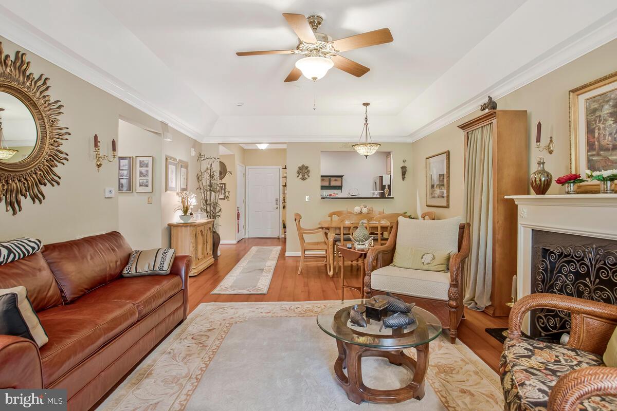 7315 Maplecrest Road, Unit 405 Elkridge, MD 21075 - Photo 17 of 76 a living room with furniture and a fireplace