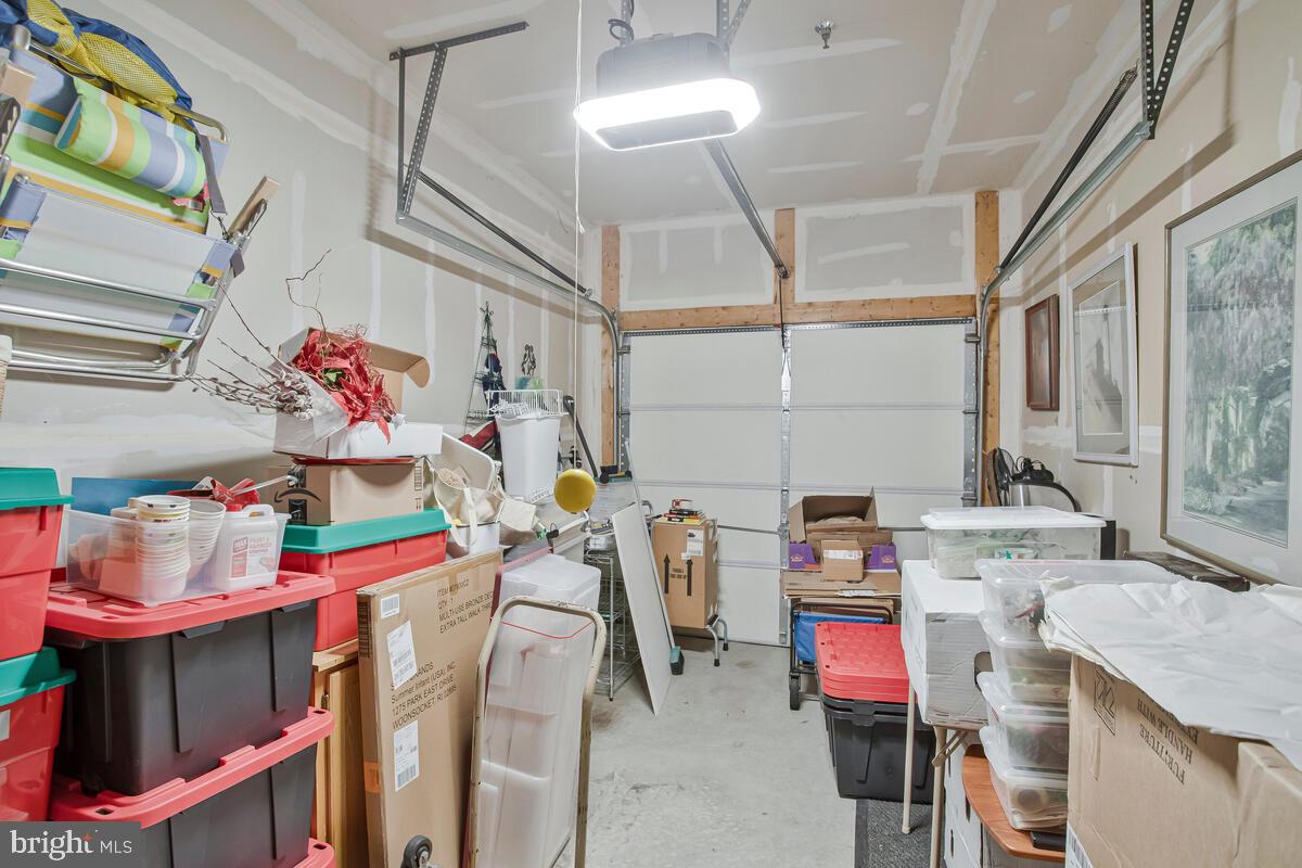 7315 Maplecrest Road, Unit 405 Elkridge, MD 21075 - Photo 36 of 76 a utility room with dryer and washer