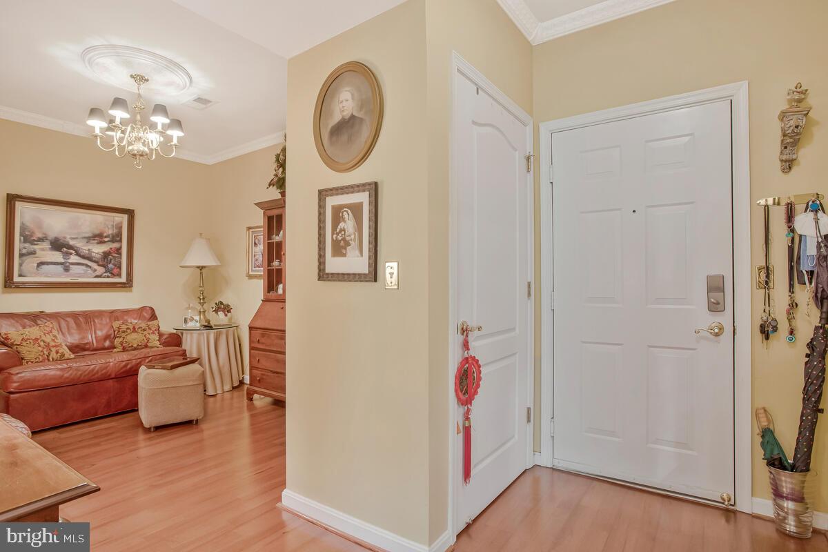 7315 Maplecrest Road, Unit 405 Elkridge, MD 21075 - Photo 4 of 76 a living room with furniture and a window