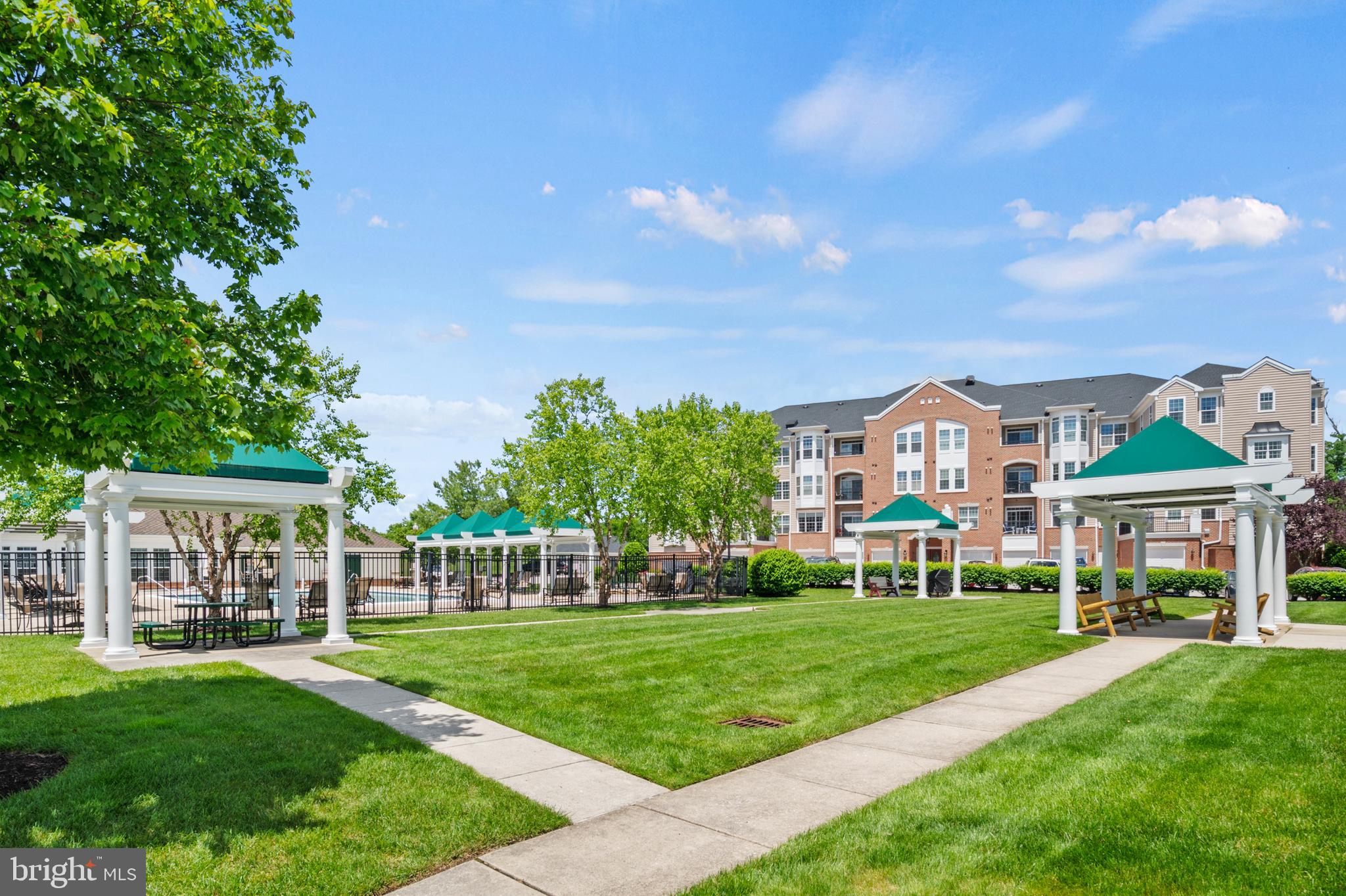 7315 Maplecrest Road, Unit 405 Elkridge, MD 21075 - Photo 66 of 76 a front view of a house with a yard