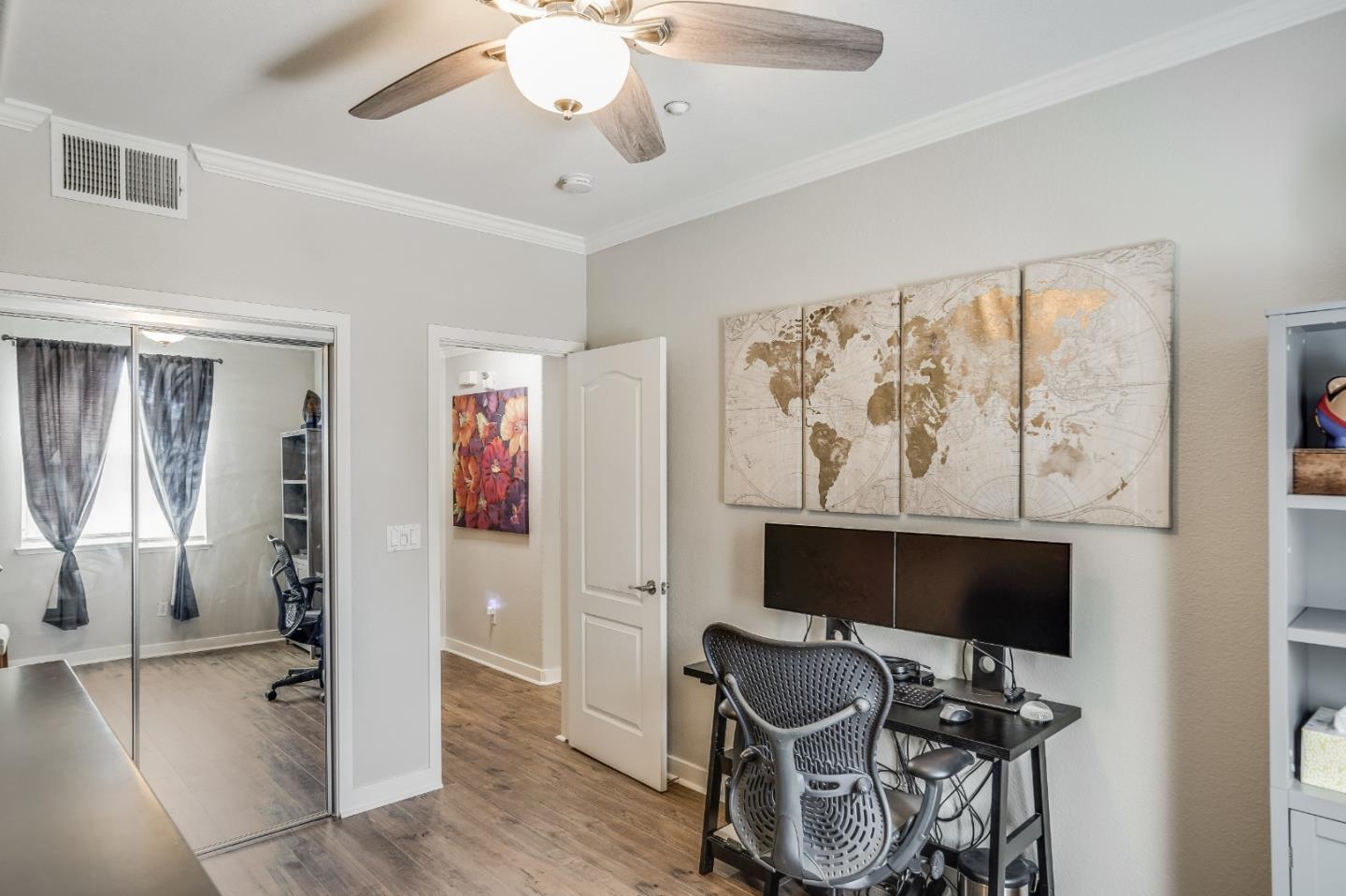 6132 Old Quarry Loop Oakland, CA 94605 - Photo 17 of 38 a view of a workspace with furniture and a window