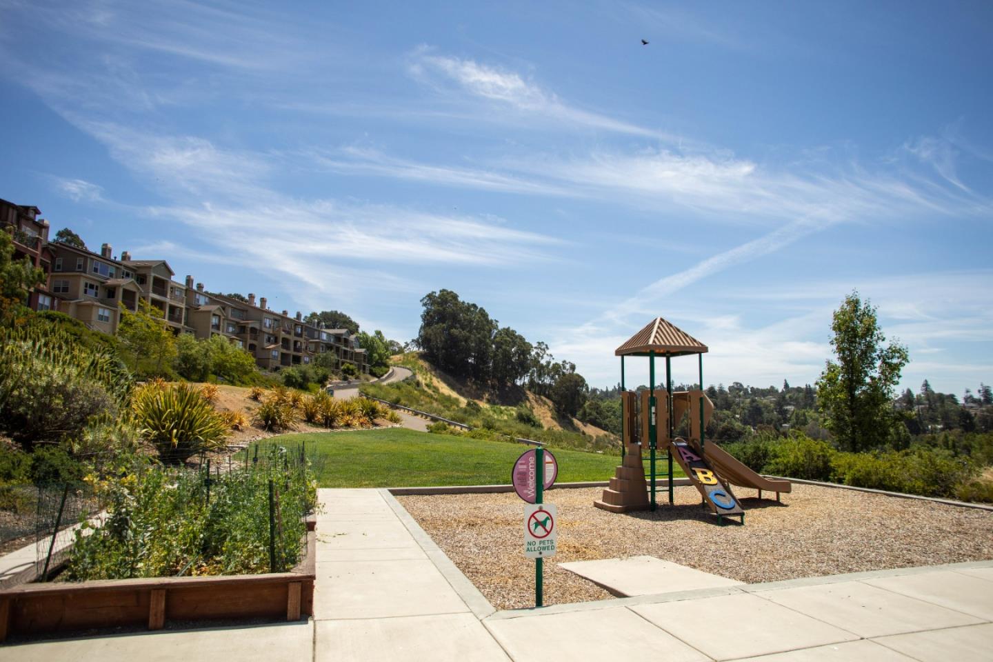 6132 Old Quarry Loop Oakland, CA 94605 - Photo 34 of 38 a view of a park with swings and slides