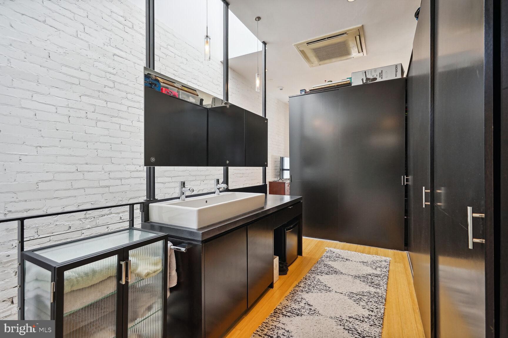 978 Florida Avenue Northwest Washington, DC 20001 - Photo 22 of 39 a bathroom with a sink and a mirror