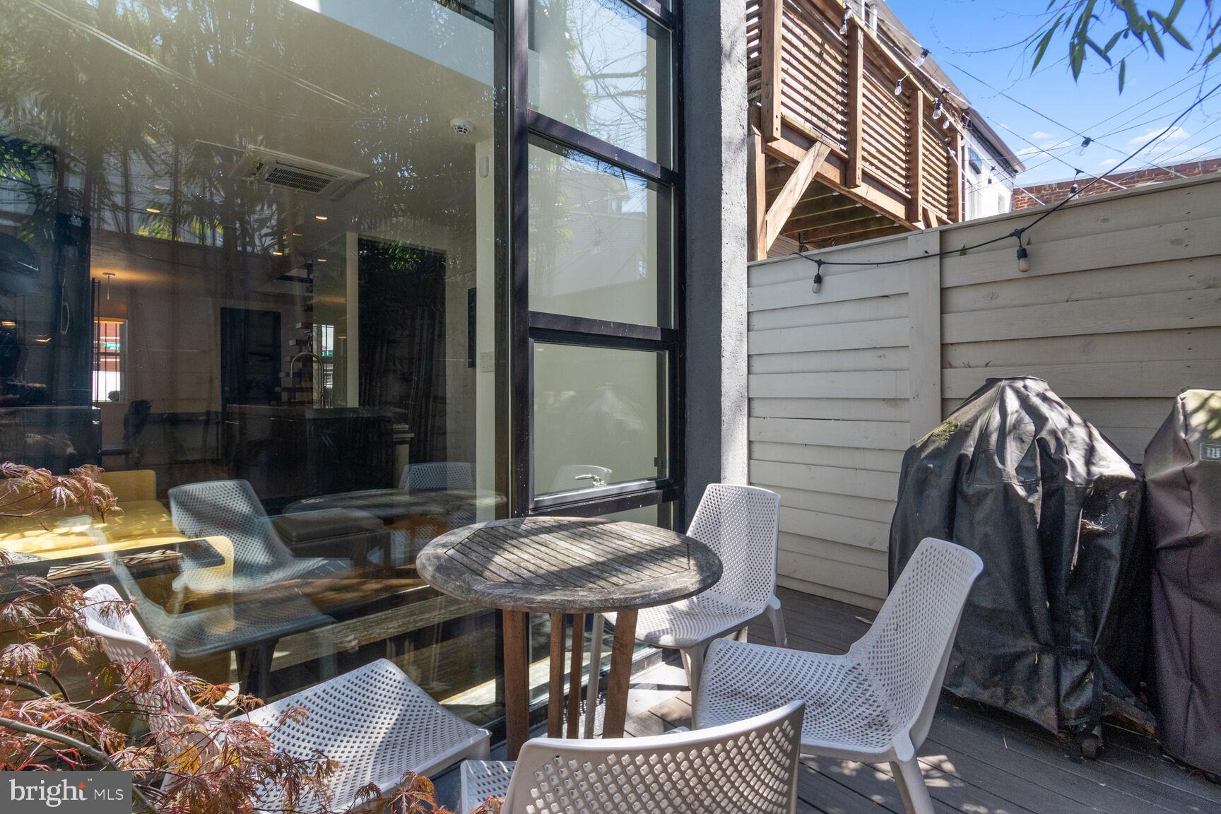 978 Florida Avenue Northwest Washington, DC 20001 - Photo 27 of 39 a view of a patio with couple of chairs