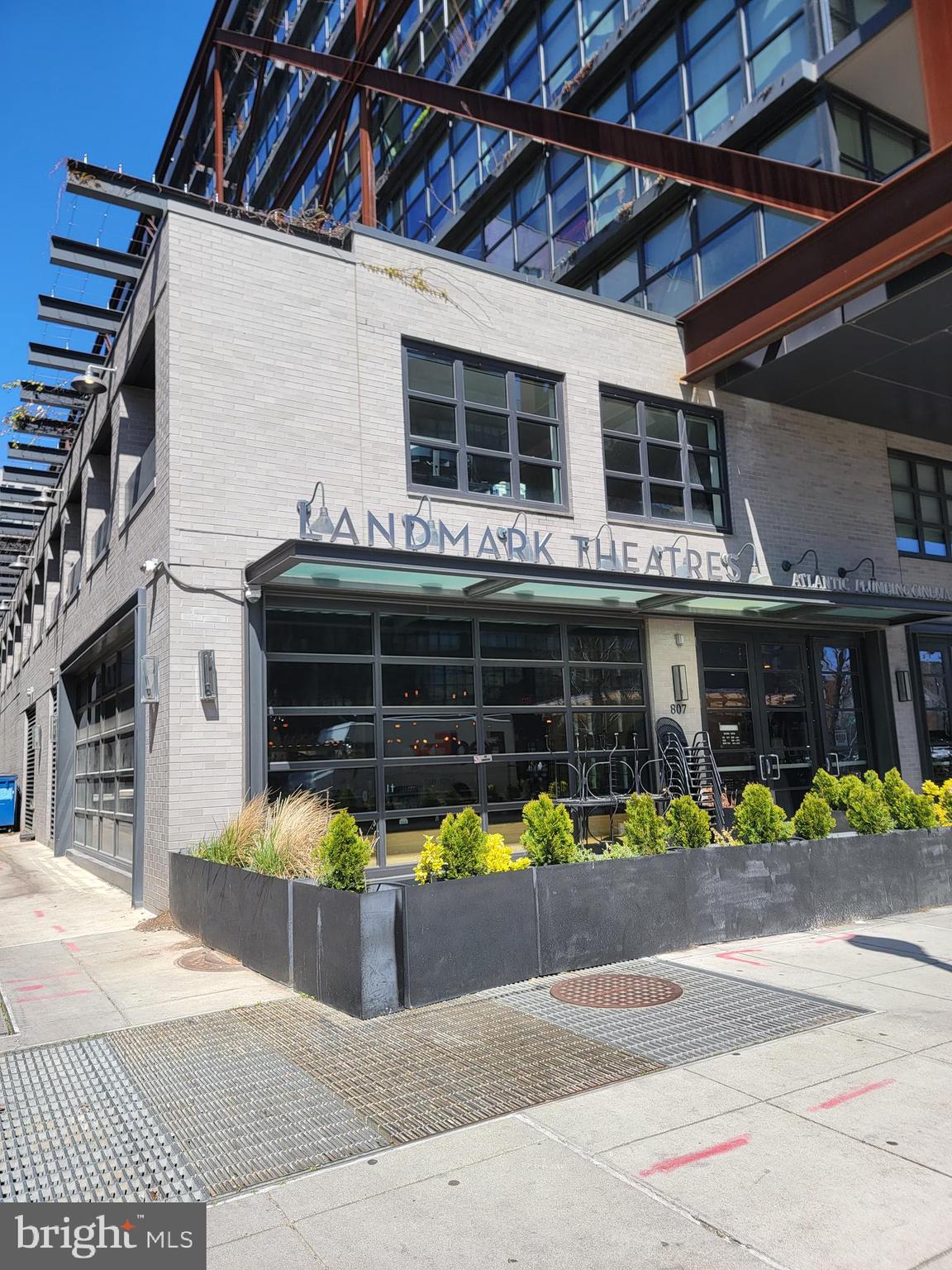 978 Florida Avenue Northwest Washington, DC 20001 - Photo 37 of 39 a front view of a building with lots of trees and plants