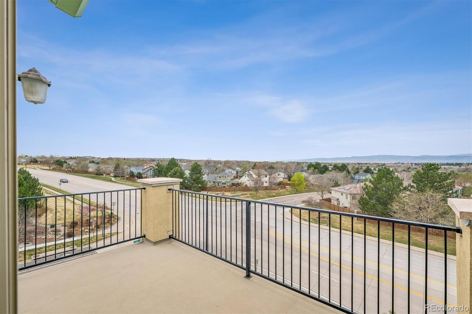 1044 Rockhurst Drive, Unit 404 Highlands Ranch, CO 80129 - Photo 4 of 28 a view of balcony with outdoor space