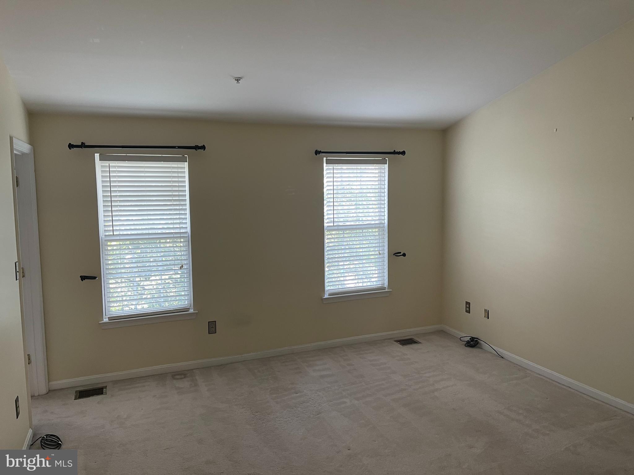 1510 Northern Neck Drive, Unit 201 Vienna, VA 22182 - Photo 12 of 16 Main bedroom, walk-in closet to the left
