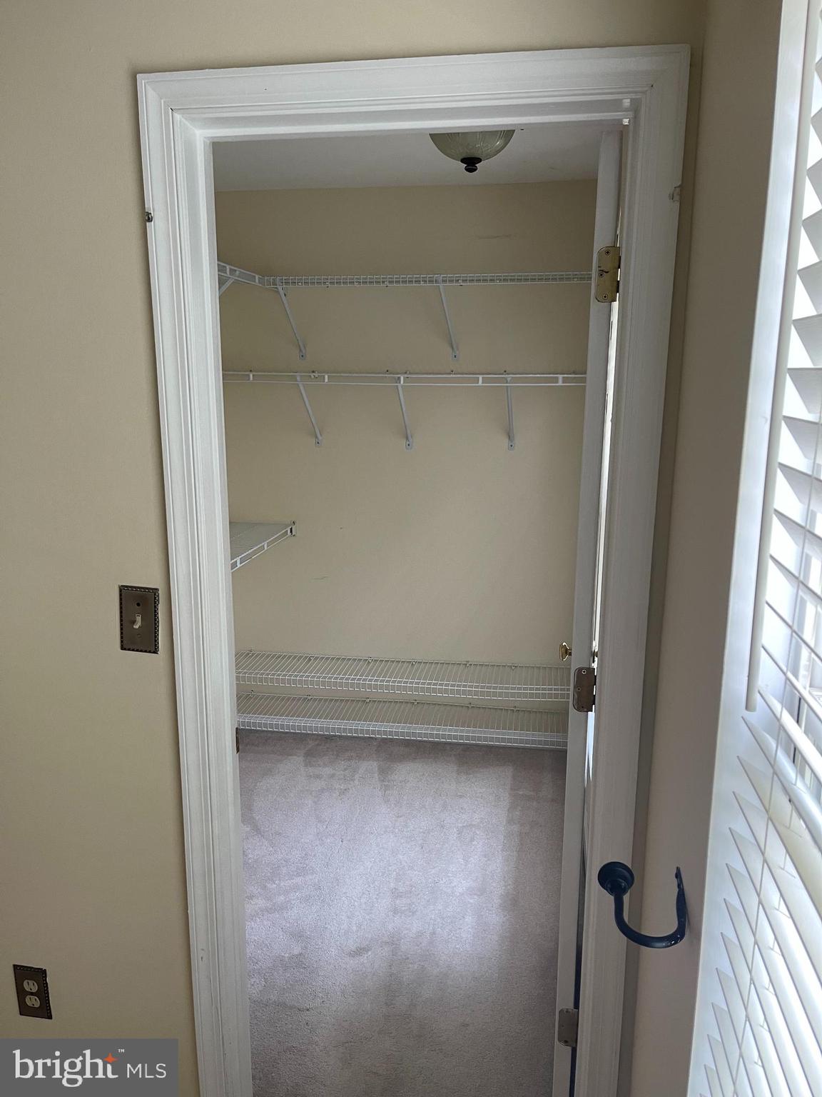 1510 Northern Neck Drive, Unit 201 Vienna, VA 22182 - Photo 13 of 16 Walk-in closet in main bedroom