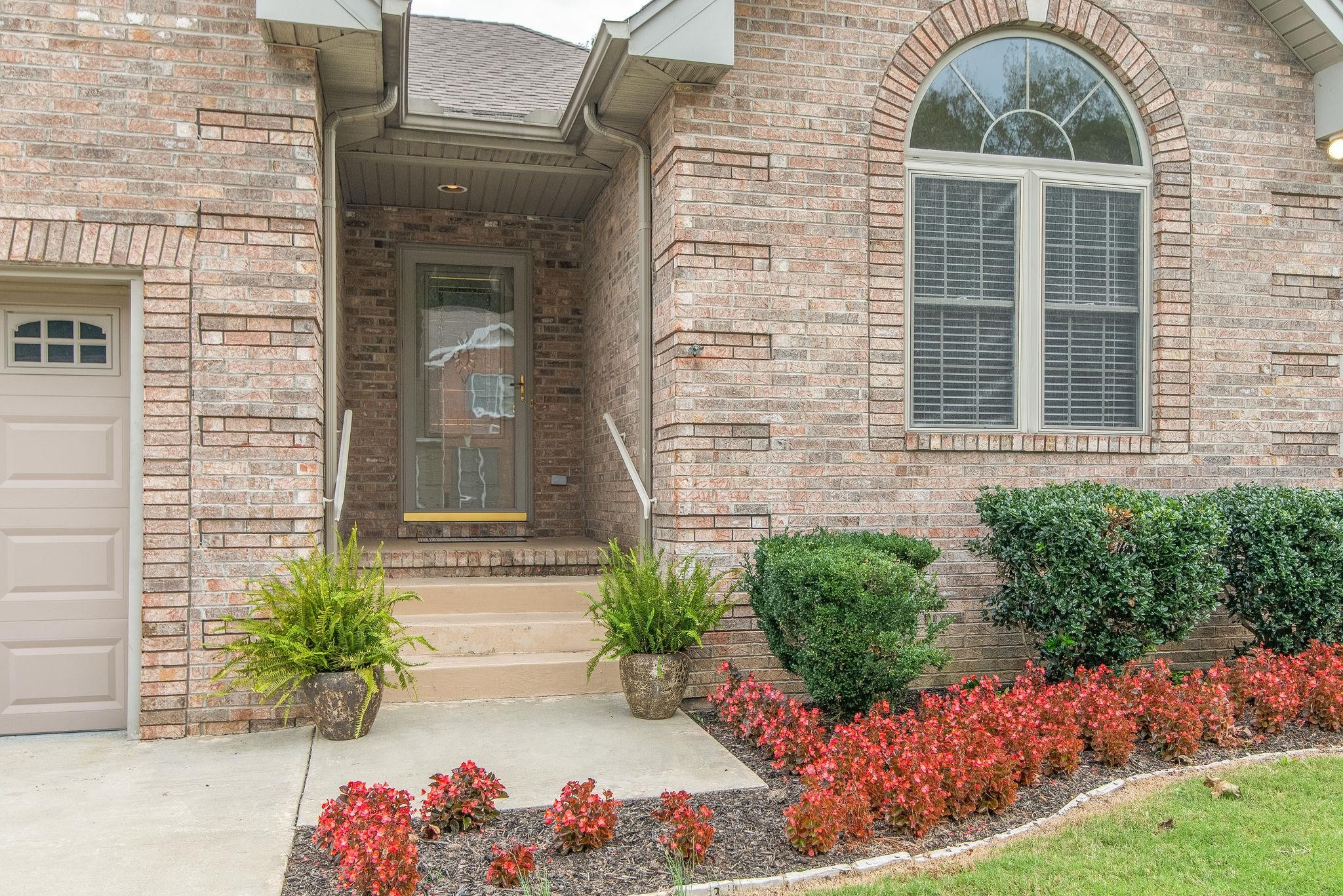 169 Foxrun Springfield, TN 37172 - Photo 3 of 24 a front view of a house with a yard