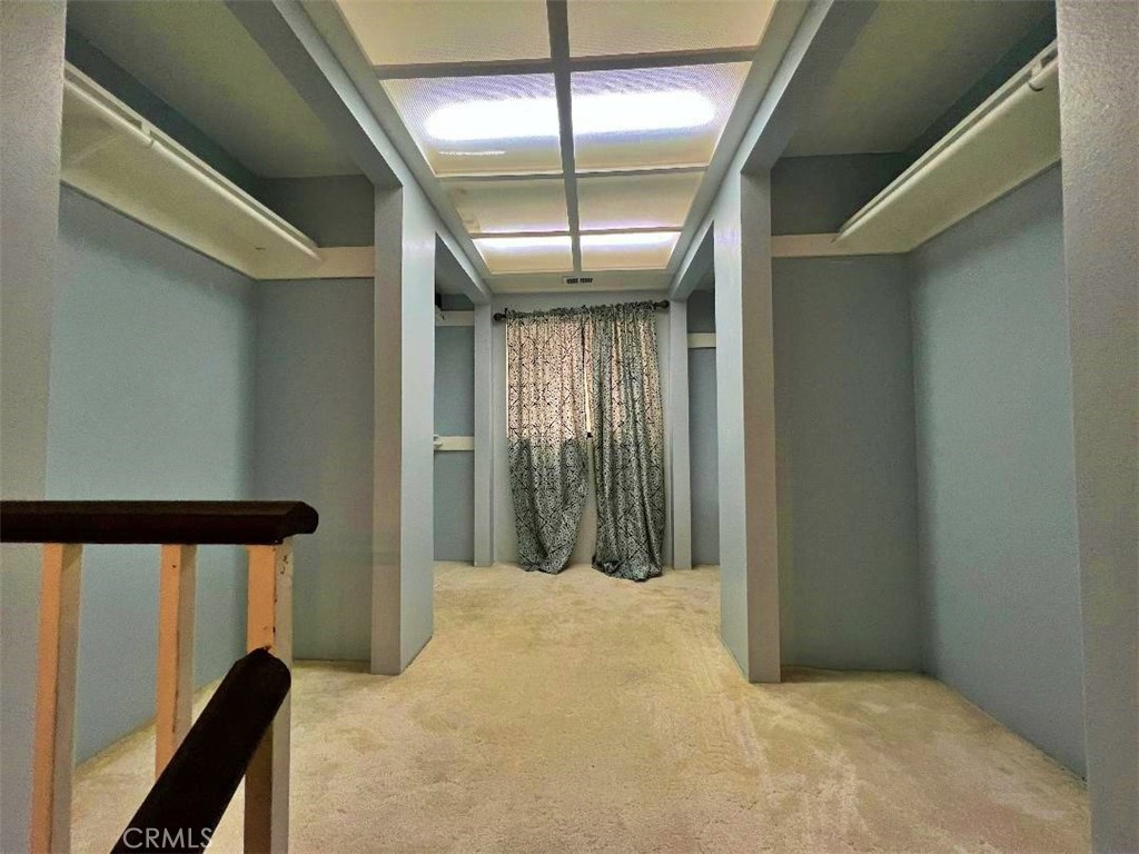 1198 Arbula Drive Crestline, CA 92325 - Photo 22 of 27 a view of a hallway with wooden floor