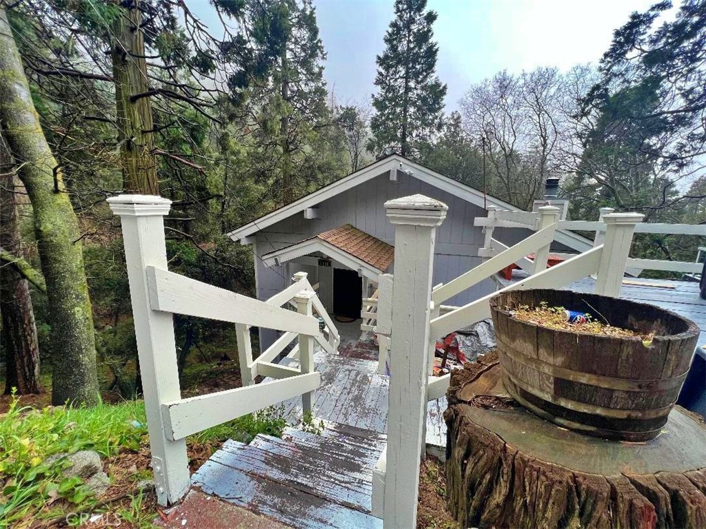 1198 Arbula Drive Crestline, CA 92325 - Photo 3 of 27 a front view of a house with a yard