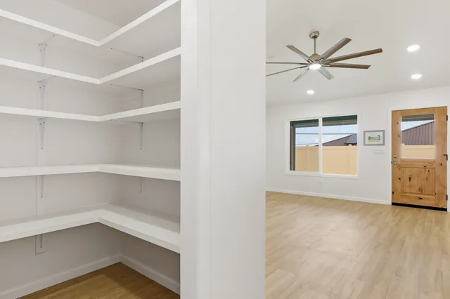 a view of an empty room with a window