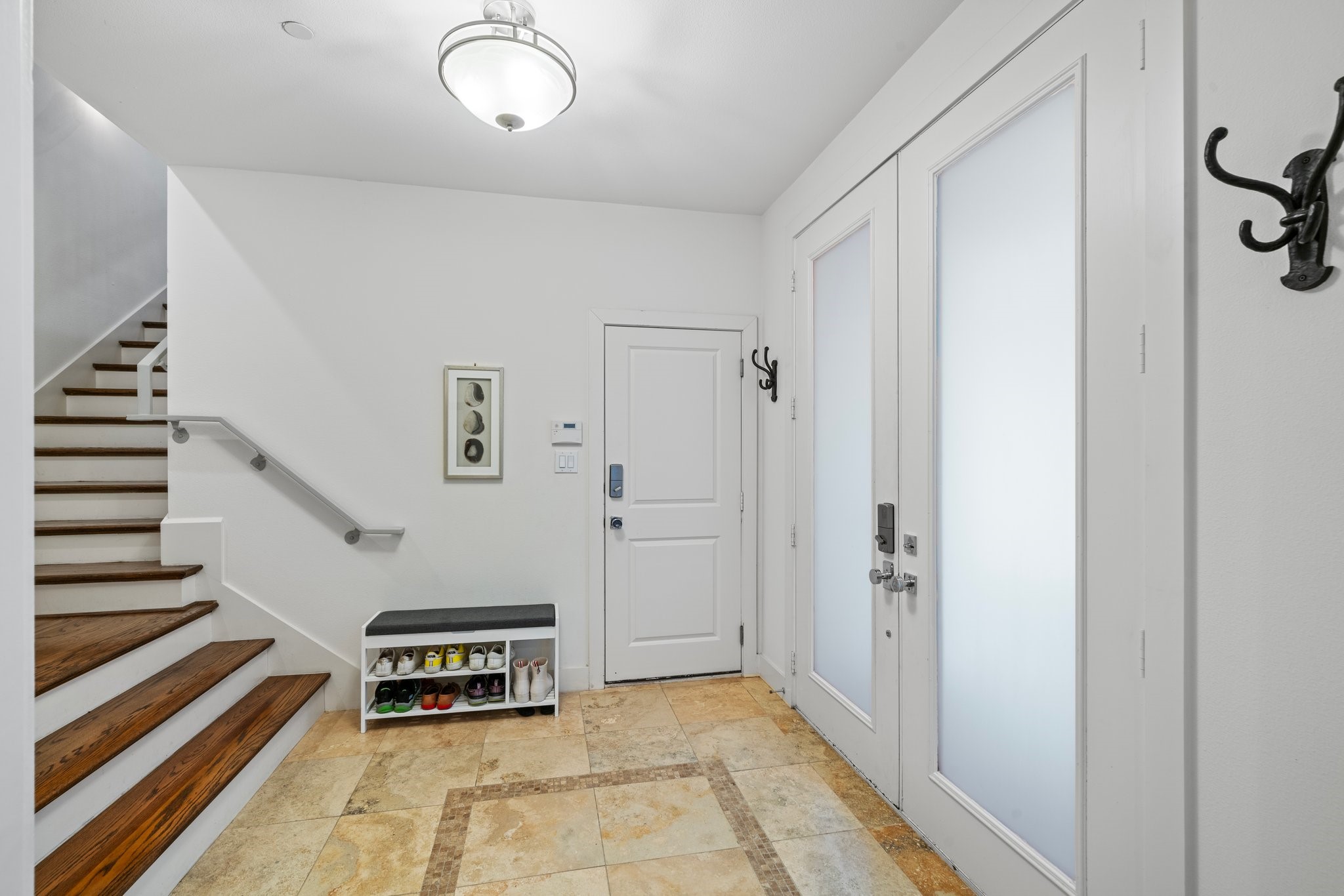 1804 Prospect Street Houston, TX 77004 - Photo 6 of 49 Spacious foyer featuring a large coat closet and the entrance to the 2 car garage.