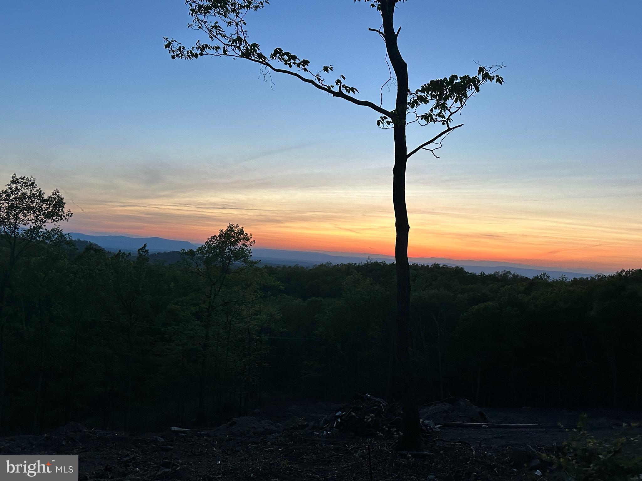 Enjoy amazing sunsets from this lot!