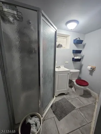 a bathroom with a sink and toilet
