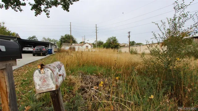 a view of a lake with a big yard