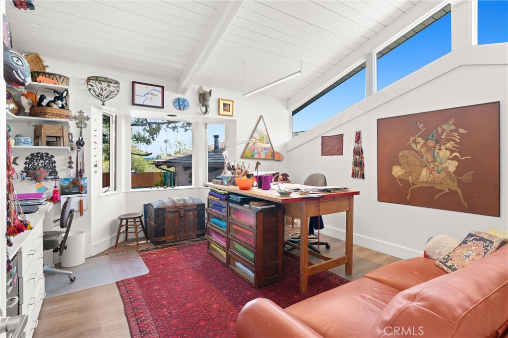 300 Emerald Bay Laguna Beach, CA 92651 - Photo 15 of 31 a bed room with a bed and a couch