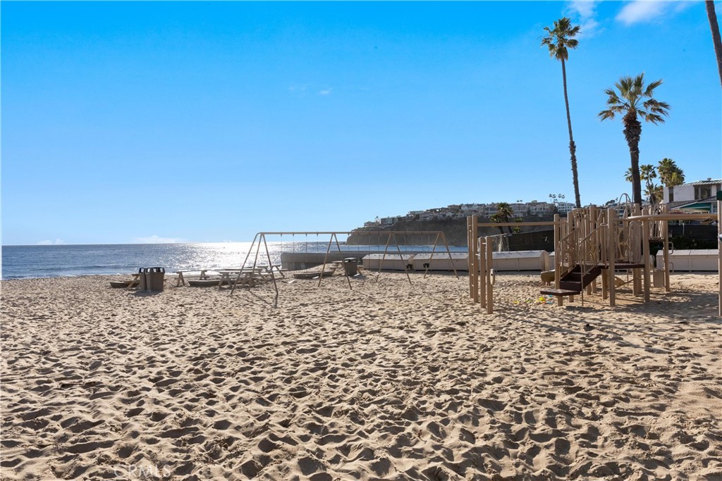 300 Emerald Bay Laguna Beach, CA 92651 - Photo 28 of 31 a view of a terrace with a bench