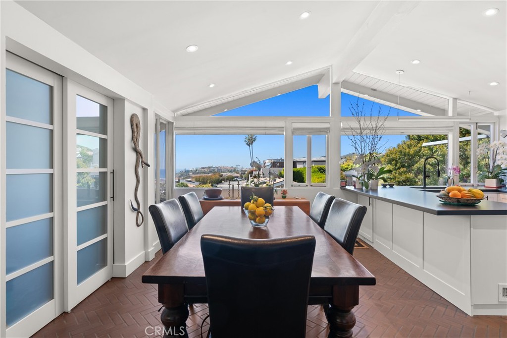 300 Emerald Bay Laguna Beach, CA 92651 - Photo 7 of 31 a view of a dining room with furniture window and outside view